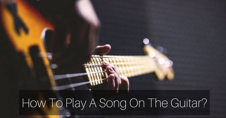 how to play a song on the guitar
